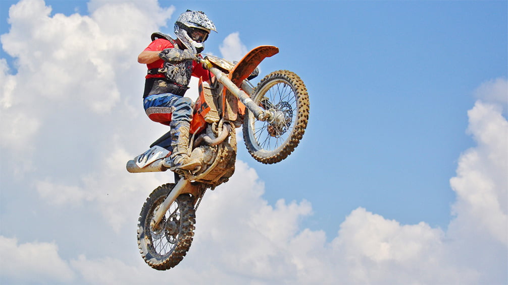 Motocross rider jumping