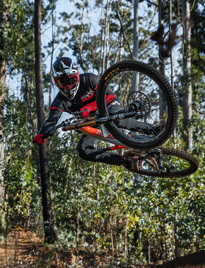 Mountain biker in mid-jump